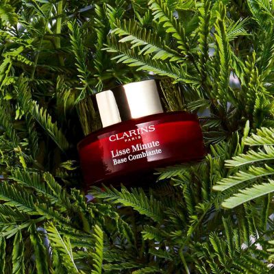 CLARINS Instant Smooth Perfecting Touch Pamats veida kosmētikai